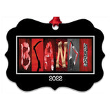 The image is a black and white collage of various images, including a silhouette of a person, a knife, and a skull, arranged to spell out the word "BANDI".