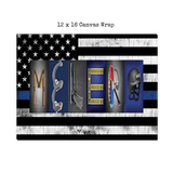 The image is a canvas wrap featuring the word "MELER" created using various objects, such as a gun, a police helmet, and a blue and white striped flag.