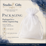 The image is a promotional advertisement for Studio & Gifts, featuring a white organza bag with a white ribbon. The ad highlights the bag's personalized gifts and features, such as being perfect for gifting, storage, and protection, and being gift ready. It also mentions that the bag is soft, elegant, and can be used for elegant presentations. The ad emphasizes that the bag is perfect for giving, storage, and protection, and it is a gift ready to be presented.