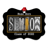 A black and white decorative frame with the word "SENIOR" spelled out in a creative, artistic way.