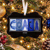 Blue wrestling coach personalized Christmas ornament with white ribbon and sample year 2026