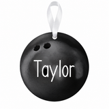 Taylor bowling ball ornament with white ribbon on white background
