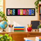 Personalized MRS BOWSER teacher letter art displayed above a classroom desk with books, pencils, and a globe.