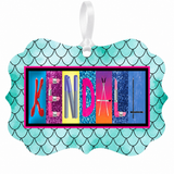 KENDALL makeup name ornament with white ribbon
