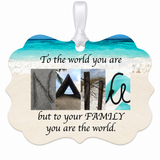 Nana beach letter art ornament with white ribbon on solid white background