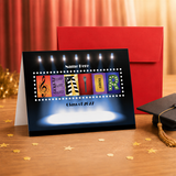 A graduation card with the word "CLASS OF 2011" written on it, surrounded by colorful stars and a red envelope, placed on a wooden surface.