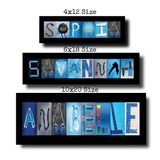 three framed name art pieces, each with a different size and design. The names are formed by arranging various images and text elements to spell out the individual's name.
