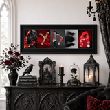 a dark and gothic-themed living room with a black table, a chandelier, and various decorative items such as a vase with roses, a candle, and a framed image.