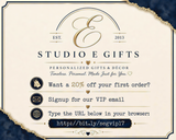 The image is a promotional graphic for a gift store called "Studio E Gifts". It features a gold and white color scheme with decorative elements such as a ribbon and a heart. The text on the image provides information about the store, including a 20% discount on the first order and instructions for signing up for a VIP email.