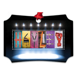 A collage of various colorful images, including a piano, a stage, and a spotlight, arranged to spell out the name "HAYLEY".