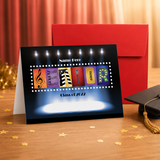 A graduation card with the word "CLASS" spelled out in colorful letters, surrounded by confetti and a graduation cap on a wooden surface.