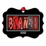 The image is a decorative frame with the word "BANDI" spelled out using various images, including a knife, a pair of scissors, and a pair of pliers.